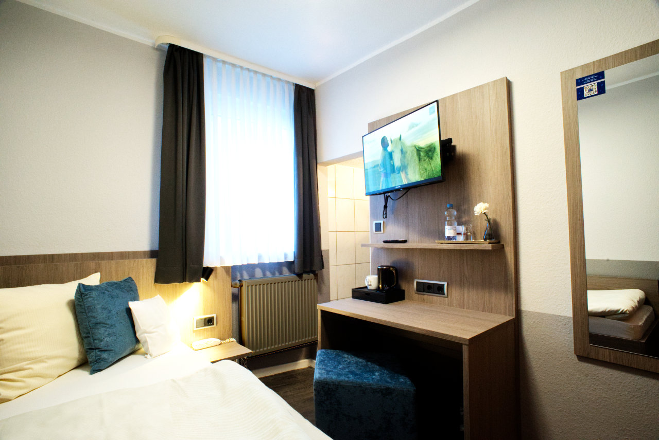 Budget-Zimmer mit Einzelbett und Schreibtisch